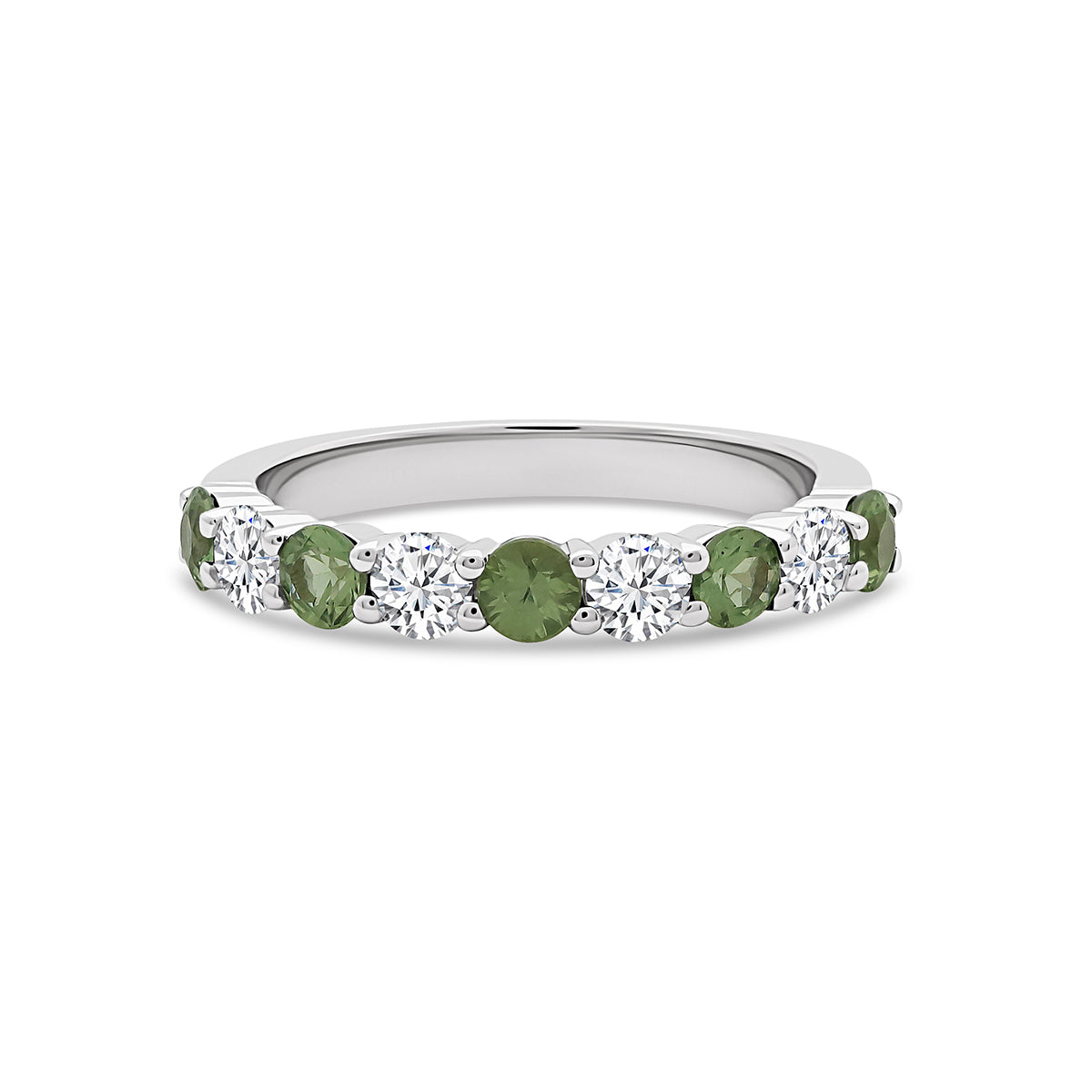 Green sapphire and diamond half eternity ring