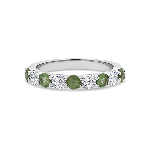 Green sapphire and diamond half eternity ring